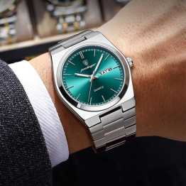 POEDAGAR Men's New Luxury Luminous Date Week Stainless Steel Quartz Watch For Men.
